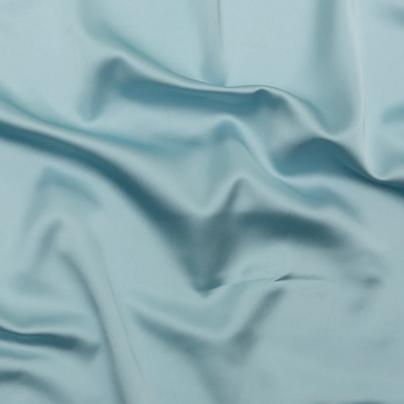 Jessica Canal Blue Stretch Satin fabric perfect for Free Corset Sewing Projects such as the The Cicely Dress Sewing Pattern free PDF download from Mood Fabrics Sewciety Blog.