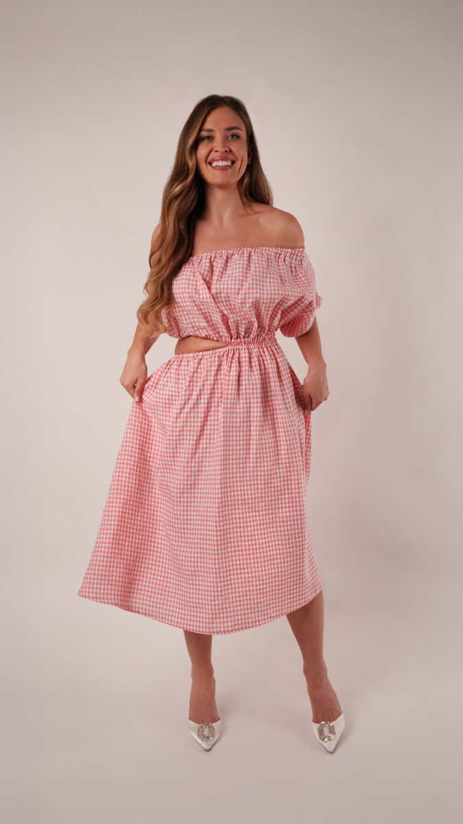 Model wearing Clementine Dress Sewing Pattern posing for Transitional Spring Sewing Project Ideas. Free Sewing Pattern PDF from Mood Fabrics Sewciety Blog.