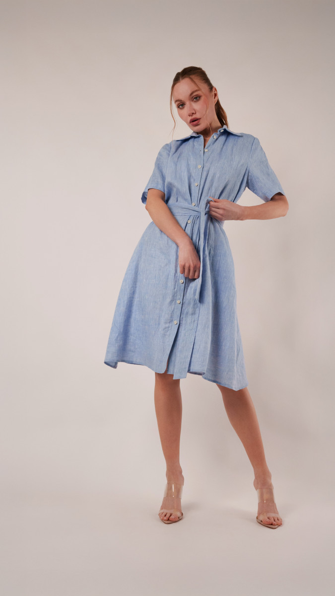 Model wearing Rosalie Shirt Dress Sewing Pattern posing for Transitional Spring Sewing Project Ideas. Free Sewing Pattern PDF from Mood Fabrics Sewciety Blog.