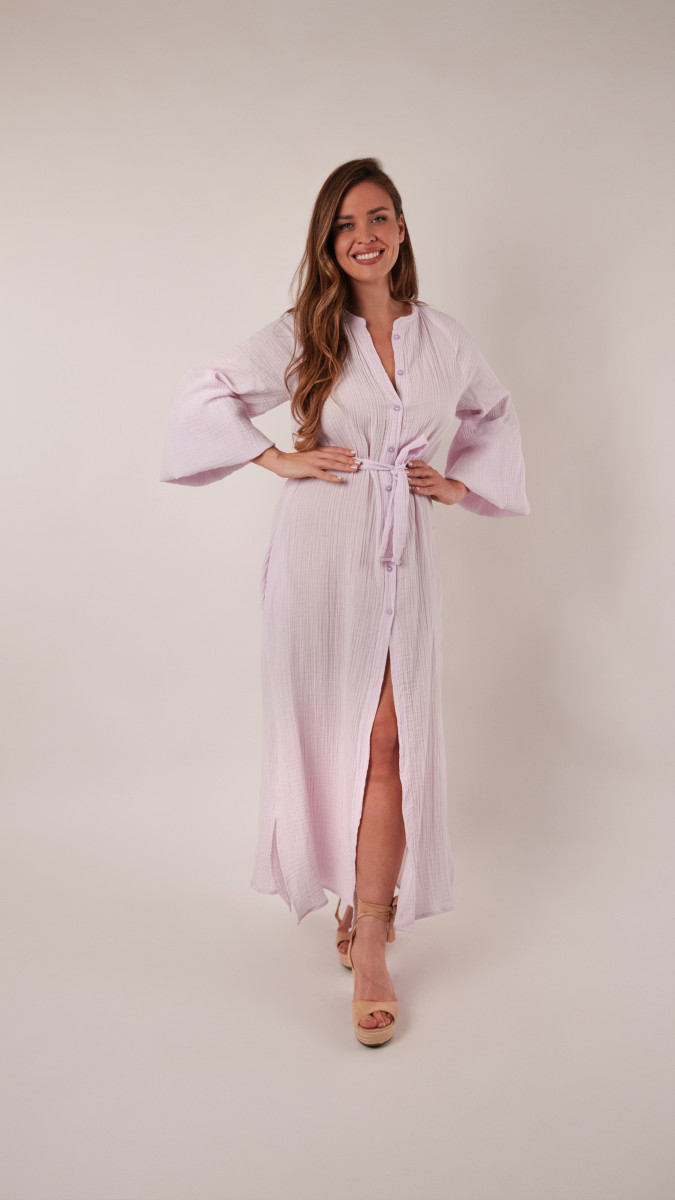 Model wearing Tundra Shirt Dress Sewing Pattern posing for Transitional Spring Sewing Project Ideas. Free Sewing Pattern PDF from Mood Fabrics Sewciety Blog.