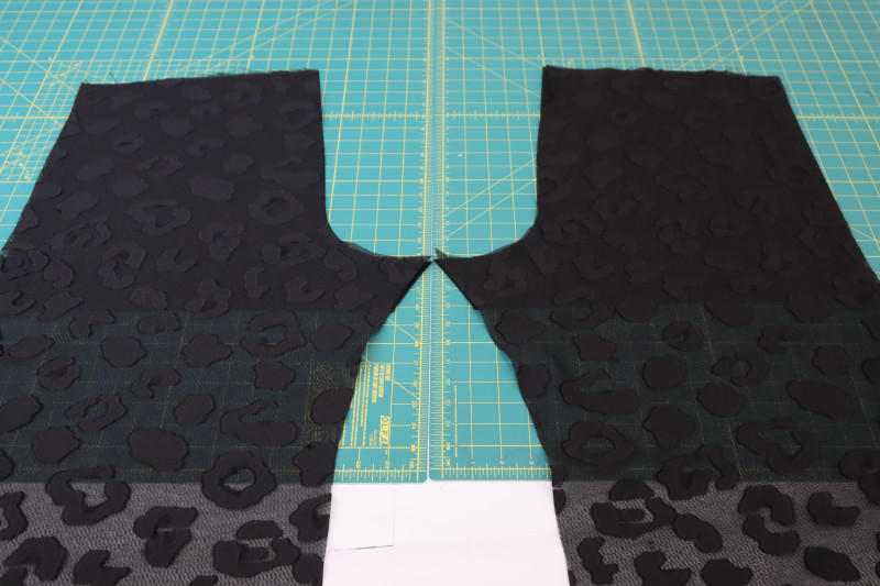 How To Layout Back Lining Back Pants - Black Quilting Cotton - Mood Fabrics - Matrix Shawl Collar Ensemble Free Sewing Pattern Tutorial - MDF543 - Mood Fabrics Sewciety Blog - Lay the back lining under the back pants pieces.