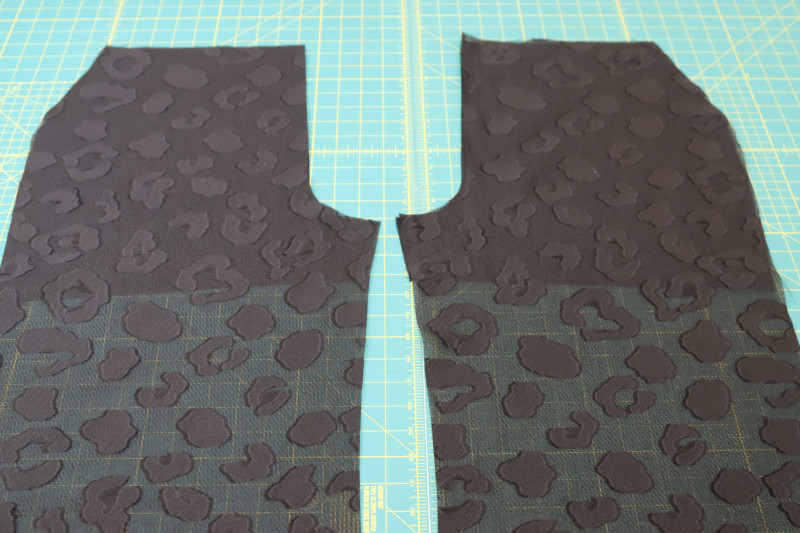 How To Layout Front Lining Front Pants - Black Quilting Cotton - Mood Fabrics - Matrix Shawl Collar Ensemble Free Sewing Pattern Tutorial - MDF543 - Mood Fabrics Sewciety Blog - Lay the front lining under the front pants pieces.
