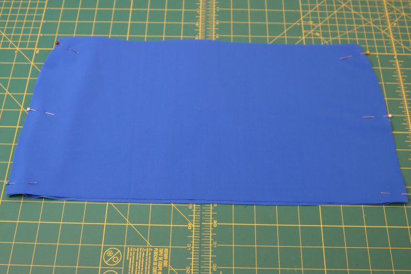 How To Pin Skirt Side Seams - Recycled Swimwear Tricot - Mood Fabrics - Azure Tankini Skirt Set Free Sewing Pattern Tutorial - MDF533 - Mood Fabrics Sewciety Blog - Pin the skirt side seams.
