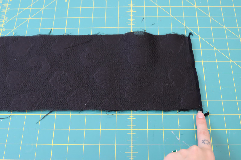 How To Sew Waistband Short Ends - Textured Burnout Brocade - Mood Fabrics - Matrix Shawl Collar Ensemble Free Sewing Pattern Tutorial - MDF543 - Mood Fabrics Sewciety Blog - Sew the short ends of the waistband together.