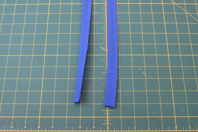 How To Trim Seam Allowance Of Straps - Recycled Swimwear Tricot - Mood Fabrics - Azure Tankini Skirt Set Free Sewing Pattern Tutorial - MDF533 - Mood Fabrics Sewciety Blog - Trim the seam allowance of the straps.