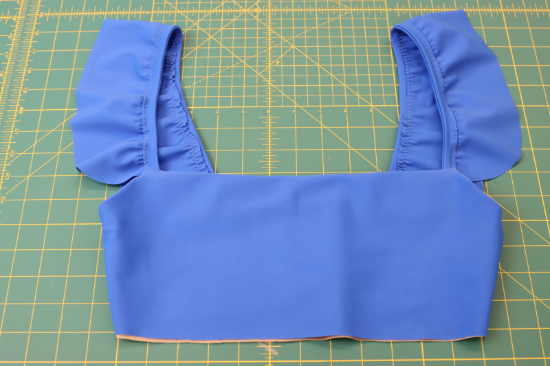 How To Flip Top Right Sides Out - Recycled Swimwear Tricot - Mood Fabrics - Azure Tankini Skirt Set Free Sewing Pattern Tutorial - MDF533 - Mood Fabrics Sewciety Blog - Flip the top right sides out.