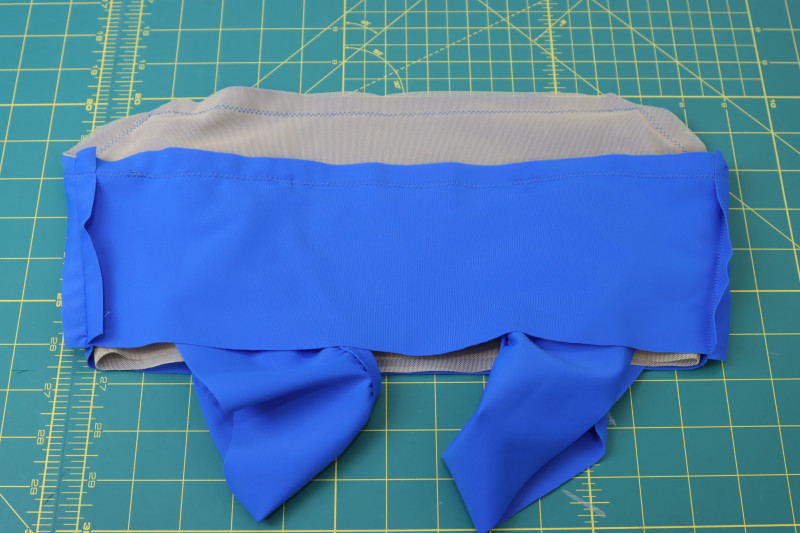 How To Sew Entire Neckline Of Top - Gutermann Sew All Thread - Mood Fabrics - Azure Tankini Skirt Set Free Sewing Pattern Tutorial - MDF533 - Mood Fabrics Sewciety Blog - Sew the entire neckline of the top.