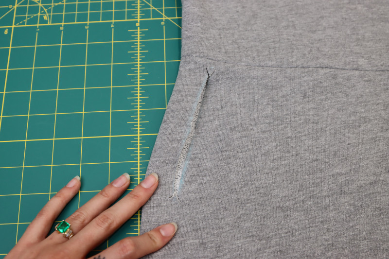 How To Cut Slits Along Chalk Marks - Heather Gray French Terry - Mood Fabrics - Reef Sleeveless Cover Up Free Sewing Pattern Tutorial - MDF535 - Mood Fabrics Sewciety Blog - Cut slits along the chalk marks as shown above.
