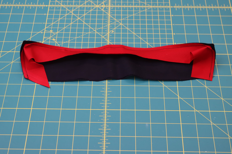 How To Pin Sew Bias Tape Collar Edge - Red Quilting Cotton - Mood Fabrics - Matrix Shawl Collar Ensemble Free Sewing Pattern Tutorial - MDF543 - Mood Fabrics Sewciety Blog - Pin and sew the bias tape to the edge of the collar.