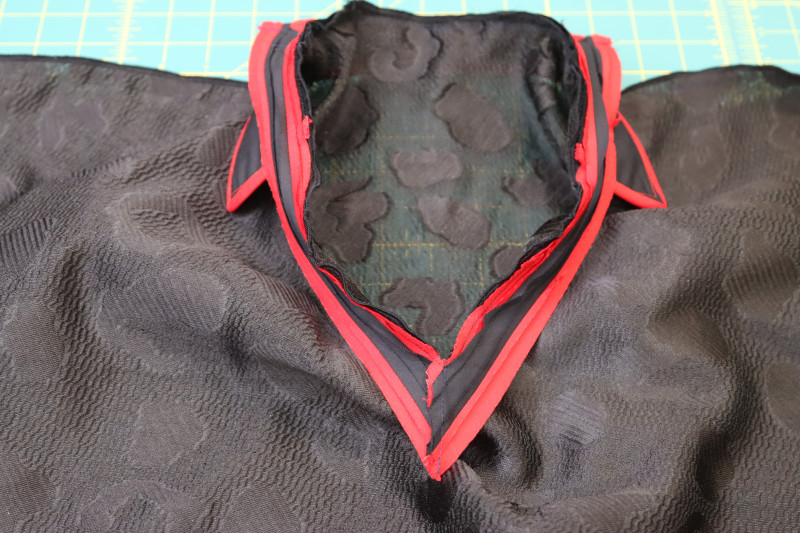 How To Sew Neckline - Textured Burnout Brocade - Mood Fabrics - Matrix Shawl Collar Ensemble Free Sewing Pattern Tutorial - MDF543 - Mood Fabrics Sewciety Blog - Sew around the neckline with ¼ inch seam allowance.