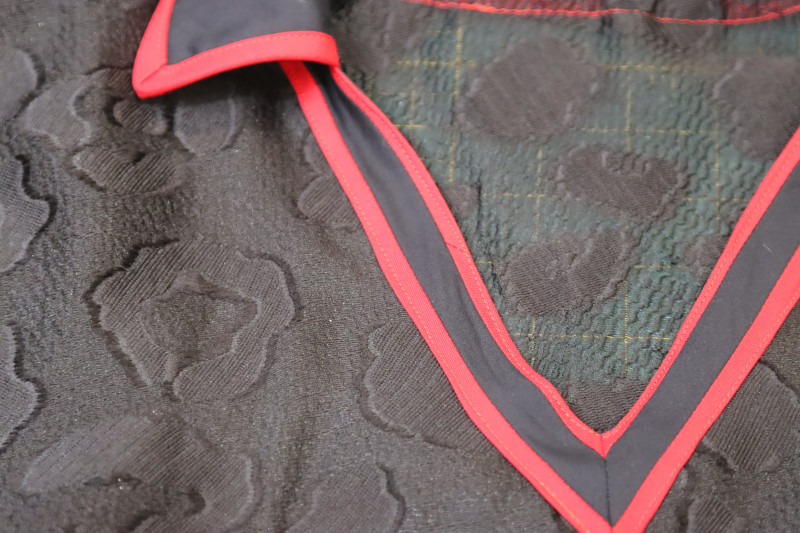 How To Topstitch Neckline Trim Edges - Gutermann Sew All Thread - Mood Fabrics - Matrix Shawl Collar Ensemble Free Sewing Pattern Tutorial - MDF543 - Mood Fabrics Sewciety Blog - Topstitch over the edges of the neckline trim.
