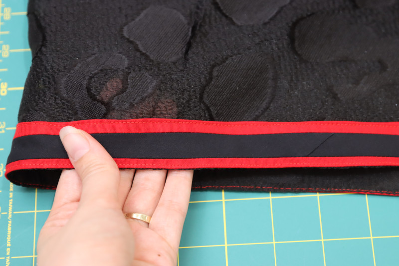 How To Topstitch Trim Edges - Gutermann Sew All Thread - Mood Fabrics - Matrix Shawl Collar Ensemble Free Sewing Pattern Tutorial - MDF543 - Mood Fabrics Sewciety Blog - Topstitch over both edges of the trim.
