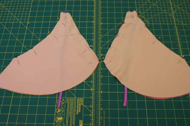 How To Pin Top Edges Bra Cups - Silk Charmeuse Print - Mood Fabrics - Alexandrite Sunset Silk Charmeuse Dress Free Sewing Pattern Tutorial - MDF529 - Mood Fabrics Sewciety Blog - Pin the top edges of the bra cups.
