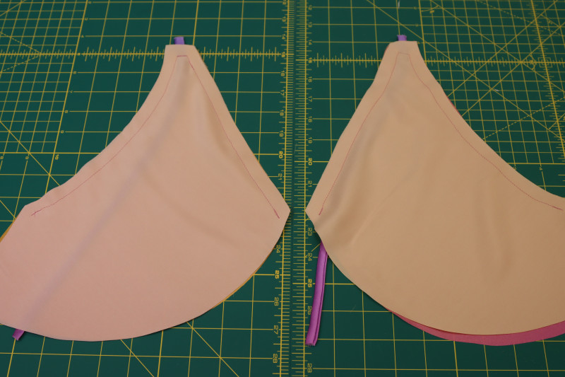 How To Sew Along Pins Bra Cups - Gutermann Sew All Thread - Mood Fabrics - Alexandrite Sunset Silk Charmeuse Dress Free Sewing Pattern Tutorial - MDF529 - Mood Fabrics Sewciety Blog - Sew along the pins on the bra cups.