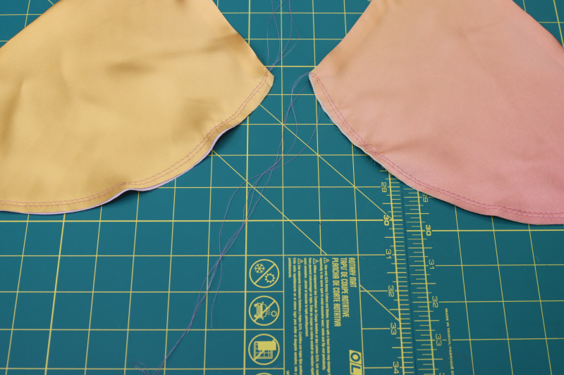 How To Sew Gathering Stitches Bottom Bra Cups - Gutermann Sew All Thread - Mood Fabrics - Alexandrite Sunset Silk Charmeuse Dress Free Sewing Pattern Tutorial - MDF529 - Mood Fabrics Sewciety Blog - Sew gathering stitches on the bottom of the bra cups.