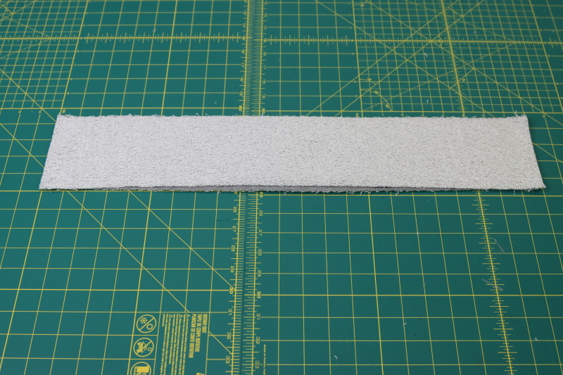How To Sew Short Sides Of Hem Bands To Each Other - Heather Gray French Terry - Mood Fabrics - Reef Sleeveless Cover Up Free Sewing Pattern Tutorial - MDF535 - Mood Fabrics Sewciety Blog - Sew the short sides of the hem bands to each other.