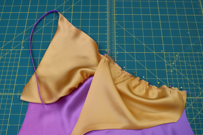 How To Pin Sew Left Bra Cup - Silk Charmeuse Print - Mood Fabrics - Alexandrite Sunset Silk Charmeuse Dress Free Sewing Pattern Tutorial - MDF529 - Mood Fabrics Sewciety Blog - Pin and sew the left bra cup.