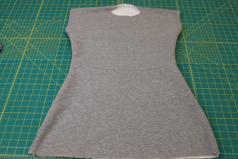 How To Press Side Seams Open And Flat - Heather Gray French Terry - Mood Fabrics - Reef Sleeveless Cover Up Free Sewing Pattern Tutorial - MDF535 - Mood Fabrics Sewciety Blog - Press the side seams open and flat.