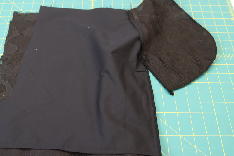 How To Sew Pocket Bag Side Seams - Textured Burnout Brocade - Mood Fabrics - Matrix Shawl Collar Ensemble Free Sewing Pattern Tutorial - MDF543 - Mood Fabrics Sewciety Blog - Sew the side seams and perimeter of the pocket bag, pivoting when you get to each corner.