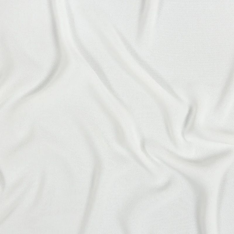 Off-White Polyester 4-Ply Crepe from the Suzie Collection fabric perfect for Free Summer Vacation Capsule Wardrobe Sewing Projects such as the Coral Bell Slip Dress Sewing Pattern free PDF download from Mood Fabrics Sewciety Blog.