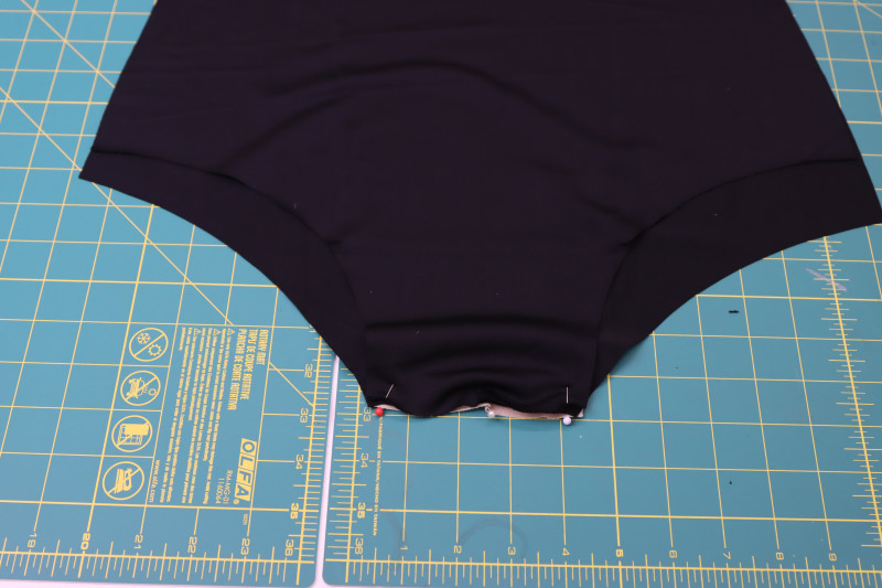 How To Pin Bikini Bottom Back And Front Right Sides Together - Recycled Swimwear Tricot - Mood Fabrics - Antikythera One Shoulder Bikini Free Sewing Pattern Tutorial - MDF531 - Mood Fabrics Sewciety Blog - Pin the bikini bottom back and bikini bottom front right sides together.