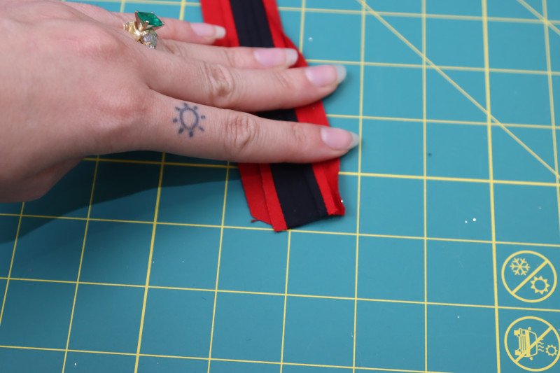 How To Sew Bias Strips - Black Quilting Cotton - Mood Fabrics - Matrix Shawl Collar Ensemble Free Sewing Pattern Tutorial - MDF543 - Mood Fabrics Sewciety Blog - Sew the bias strips together.