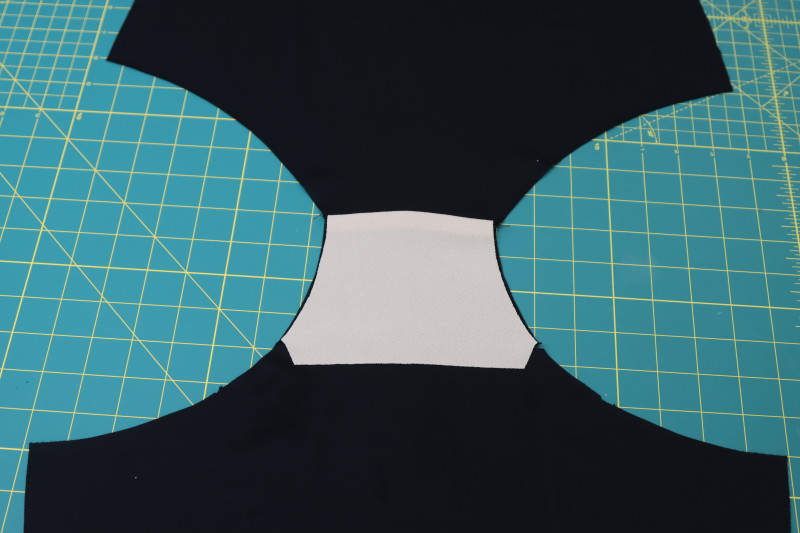 How To Sew Gusset Into Crotch Seam - Recycled Swimwear Tricot - Mood Fabrics - Antikythera One Shoulder Bikini Free Sewing Pattern Tutorial - MDF531 - Mood Fabrics Sewciety Blog - Sew the gusset into the crotch seam.