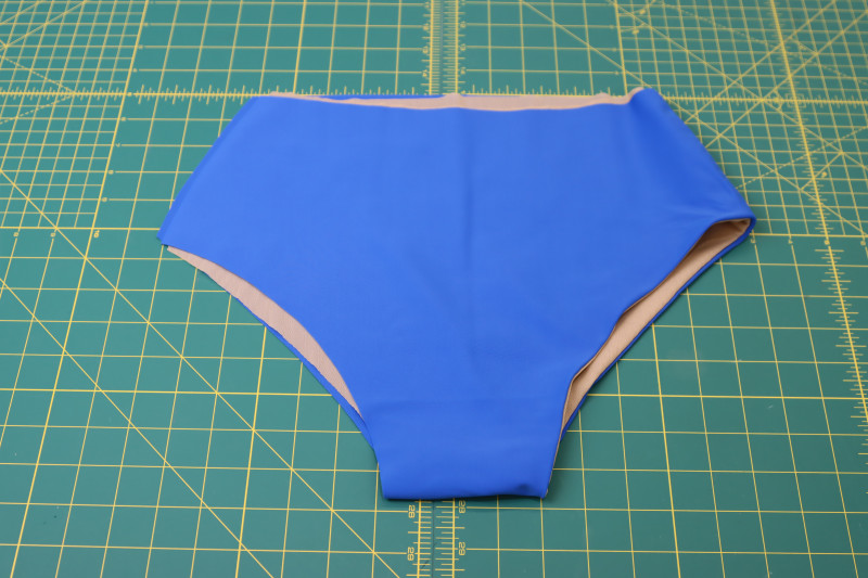 How To Flip Bikini Bottoms Right Sides Out - Recycled Swimwear Tricot - Mood Fabrics - Azure Tankini Skirt Set Free Sewing Pattern Tutorial - MDF533 - Mood Fabrics Sewciety Blog - Flip the bikini bottoms right sides out.