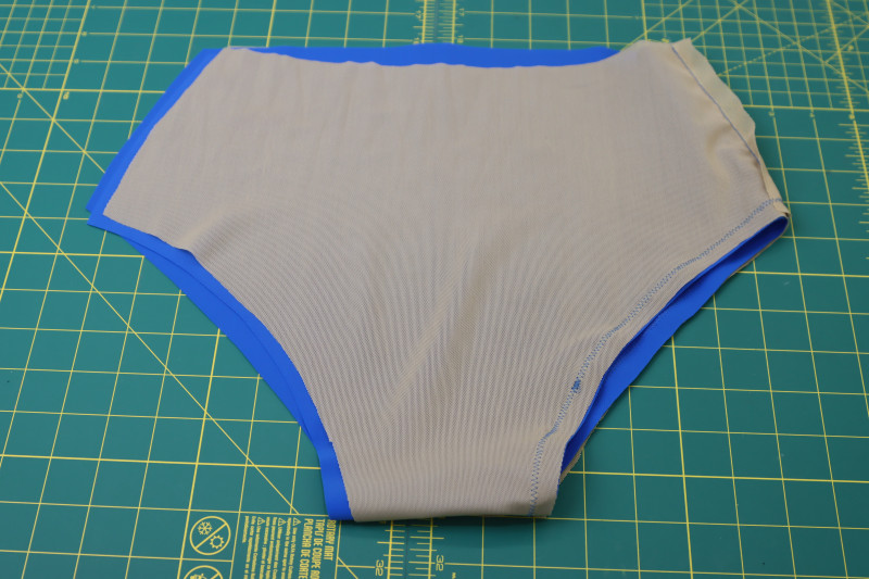 How To Sew Leg Hole - Recycled Swimwear Tricot - Mood Fabrics - Azure Tankini Skirt Set Free Sewing Pattern Tutorial - MDF533 - Mood Fabrics Sewciety Blog - Sew the leg hole.