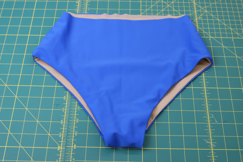 How To Flip Bikini Bottoms Right Sides Out - Recycled Swimwear Tricot - Mood Fabrics - Azure Tankini Skirt Set Free Sewing Pattern Tutorial - MDF533 - Mood Fabrics Sewciety Blog - Flip the bikini bottoms right sides out.