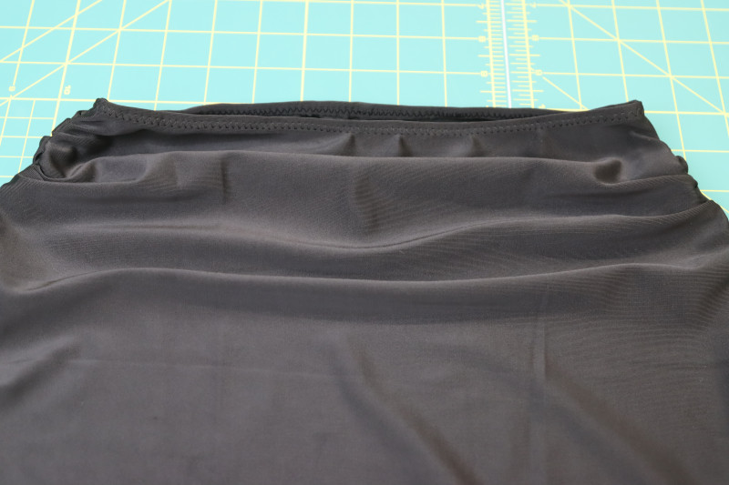 How To Topstitch Waistband Elastic With Zigzag Stitch - Cotton Swimwear Elastic - Mood Fabrics - Antikythera One Shoulder Bikini Free Sewing Pattern Tutorial - MDF531 - Mood Fabrics Sewciety Blog - Topstitch over the waistband elastic with a zigzag stitch.