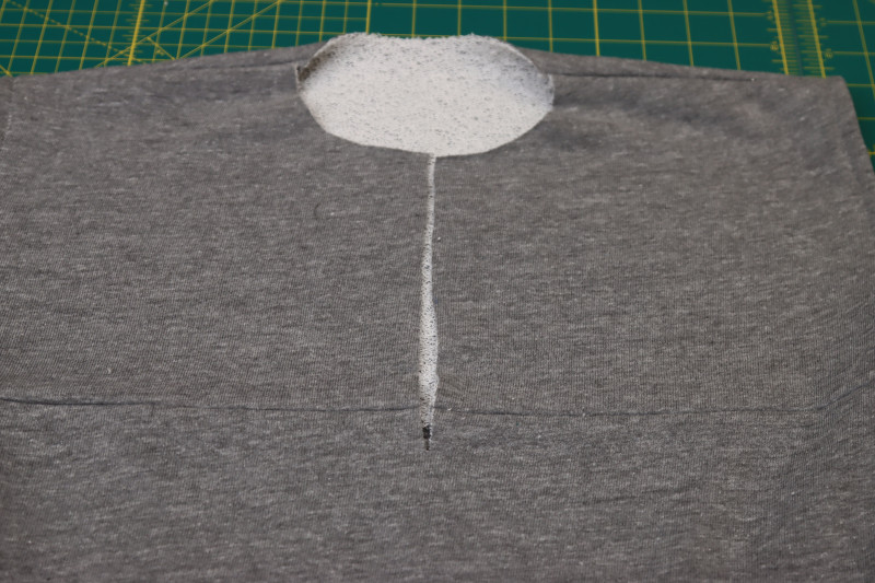 How To Cut Center Front Slit For Zipper - Heather Gray French Terry - Mood Fabrics - Reef Sleeveless Cover Up Free Sewing Pattern Tutorial - MDF535 - Mood Fabrics Sewciety Blog - Cut the center front slit for the zipper.