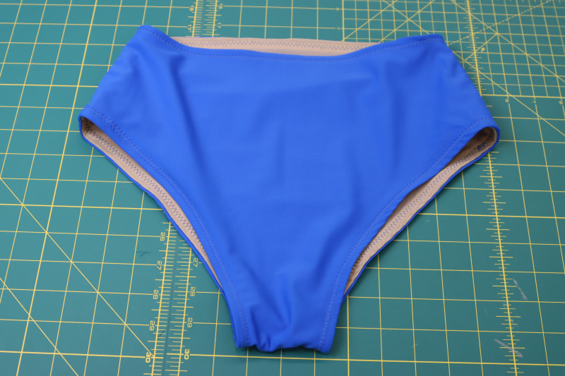 How To Sew Leg And Waist Openings - Recycled Swimwear Tricot - Mood Fabrics - Azure Tankini Skirt Set Free Sewing Pattern Tutorial - MDF533 - Mood Fabrics Sewciety Blog - Zigzag stitch over the leg and waist openings.