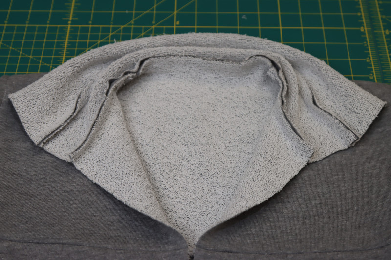 How To Sew Collar To Neckline - Heather Gray French Terry - Mood Fabrics - Reef Sleeveless Cover Up Free Sewing Pattern Tutorial - MDF535 - Mood Fabrics Sewciety Blog - Sew the collar to the neckline.
