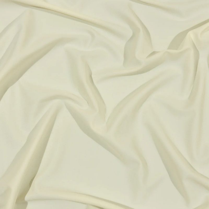 Ivory Recycled Swimwear Tricot, UV Protective from the Santorini Plus Collection fabric perfect for Free Summer Vacation Capsule Wardrobe Sewing Projects such as the Clara Bodysuit Sewing Pattern free PDF download from Mood Fabrics Sewciety Blog.