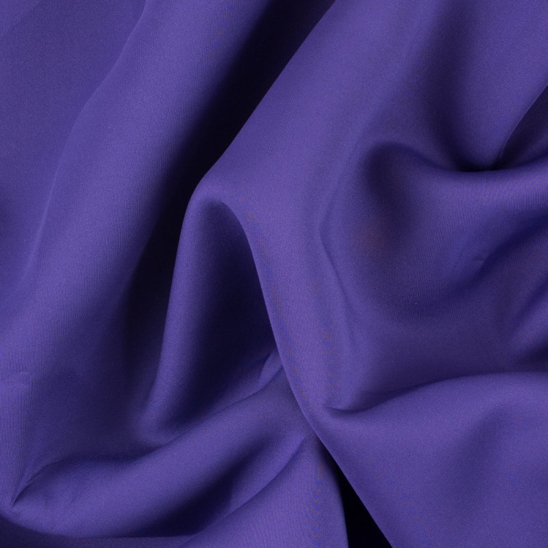 1.5mm Purple Solid Stretch Neoprene fabric perfect for Free Summer Vacation Capsule Wardrobe Sewing Projects such as the Reed Swimsuit Sewing Pattern free PDF download from Mood Fabrics Sewciety Blog.