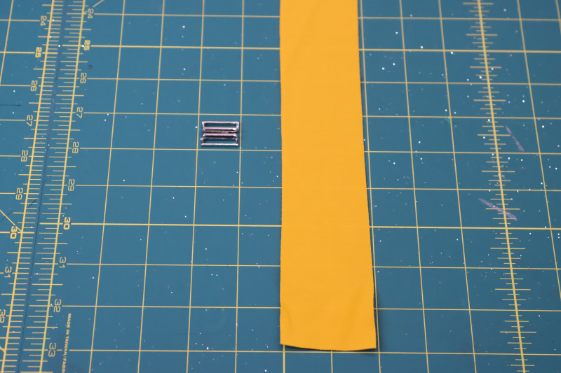 How To Cut Belt Fabric Strip - UV Protective Swimwear Tricot - Mood Fabrics - Amber Two Piece Cheeky Swimsuit Free Sewing Pattern Tutorial - MDF540 - Mood Fabrics Sewciety Blog - Cut a strip of fabric for the belt that is 2 inches wide and 1 inch longer than your waist.