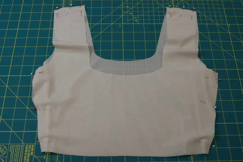 How To Pin Top Lining Side Shoulder Seams - Nude Powernet Mesh - Mood Fabrics - Amber Two Piece Cheeky Swimsuit Free Sewing Pattern Tutorial - MDF540 - Mood Fabrics Sewciety Blog - Pin the front and back top lining pieces at the side and shoulder seams.