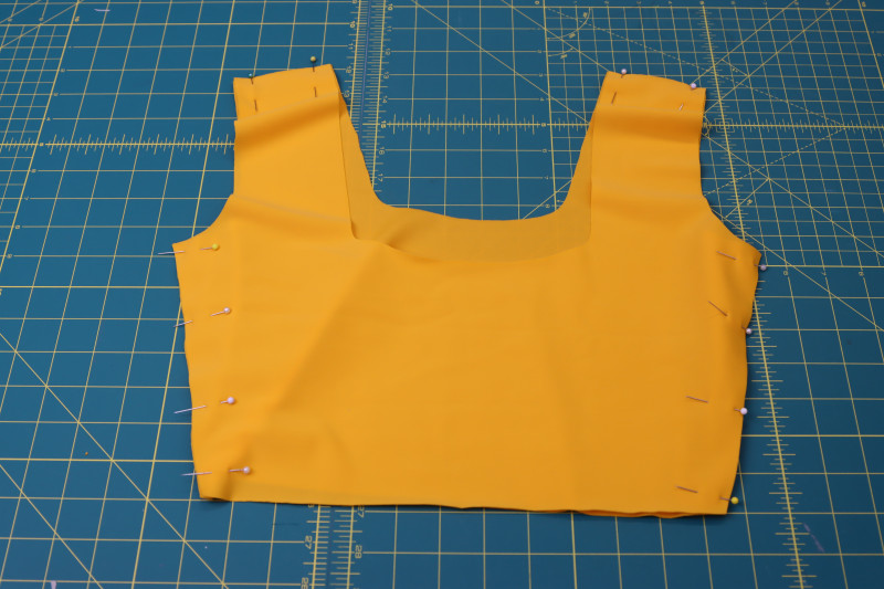 How To Pin Main Fabric Top Side Shoulder Seams - UV Protective Swimwear Tricot - Mood Fabrics - Amber Two Piece Cheeky Swimsuit Free Sewing Pattern Tutorial - MDF540 - Mood Fabrics Sewciety Blog - Pin the main fabric top pieces right sides together at the side and shoulder seams.