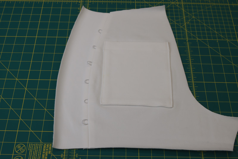 How To Press Back Side Seam Allowances - Fleece Backed Stretch Cotton Knit - Mood Fabrics - Fiona Athletic Set Free Sewing Pattern Tutorial - MDF537 - Mood Fabrics Sewciety Blog - Press the side seam allowance open and flat.