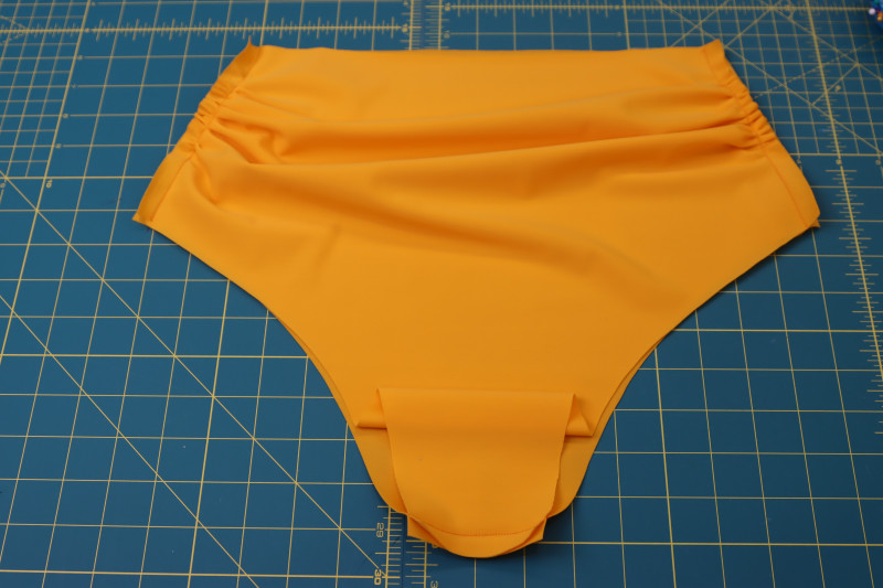 How To Sew Main Fabric Bottom Side Crotch Seams - UV Protective Swimwear Tricot - Mood Fabrics - Amber Two Piece Cheeky Swimsuit Free Sewing Pattern Tutorial - MDF540 - Mood Fabrics Sewciety Blog - Sew the main fabric bottoms at the sides and crotch seams.