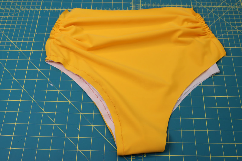 How To Sew Leg Hole - UV Protective Swimwear Tricot - Mood Fabrics - Amber Two Piece Cheeky Swimsuit Free Sewing Pattern Tutorial - MDF540 - Mood Fabrics Sewciety Blog - Sew around one of the leg holes.