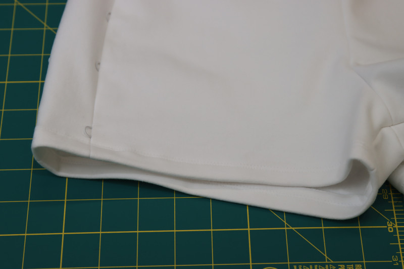 How To Hem Shorts Hem - Gutermann Sew All Thread - Mood Fabrics - Fiona Athletic Set Free Sewing Pattern Tutorial - MDF537 - Mood Fabrics Sewciety Blog - Hem the shorts with a straight stitch.