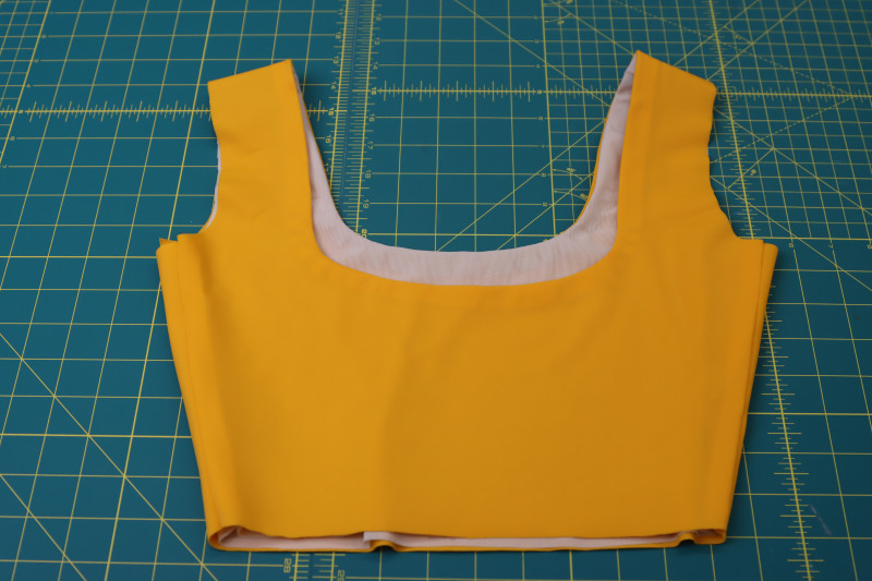 How To Flip Bikini Top Right Side Out - UV Protective Swimwear Tricot - Mood Fabrics - Amber Two Piece Cheeky Swimsuit Free Sewing Pattern Tutorial - MDF540 - Mood Fabrics Sewciety Blog - Flip the bikini top right sides out.