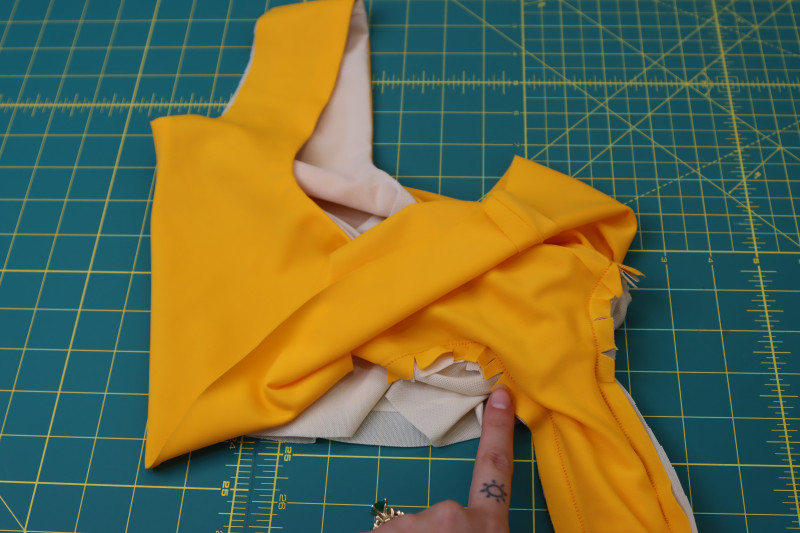 How To Pin Sew Armscye Rounded Corners - UV Protective Swimwear Tricot - Mood Fabrics - Amber Two Piece Cheeky Swimsuit Free Sewing Pattern Tutorial - MDF540 - Mood Fabrics Sewciety Blog - Pin and sew around the armscye, clipping the rounded corners of the seam allowance.
