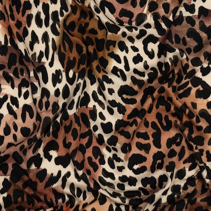 Rayon Challis - Beige and Black Leopard Spots - Animato Print - Mood Exclusive Viso Collection fabric perfect for Free Swimsuit Sewing Projects such as the Tropea High Slit Slip Dress Sewing Pattern free PDF download from Mood Fabrics Sewciety Blog.
