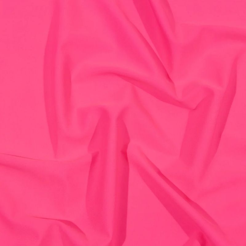 Recycled Swimwear Tricot, UV Protective - Shocking Pink - Santorini Plus Collection fabric perfect for Free Swimsuit Sewing Projects such as the Sherwood Swimsuit Sewing Pattern free PDF download from Mood Fabrics Sewciety Blog.