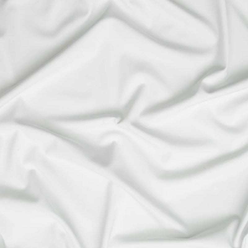 White High Compression PowerNet Mesh fabric perfect for Free Swimsuit Sewing Projects such as the Oahu Swimsuit Sewing Pattern free PDF download from Mood Fabrics Sewciety Blog.