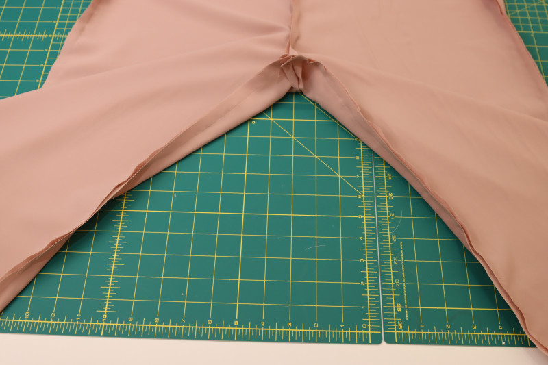 How To Pin Sew Inner Pants Inseam - Blush Polyester Double Georgette - Mood Fabrics - Ojai Reversive Wide Leg Pants Free Sewing Pattern Tutorial - MDF545 - Mood Fabrics Sewciety Blog - Pin and sew the inner pants inseam.