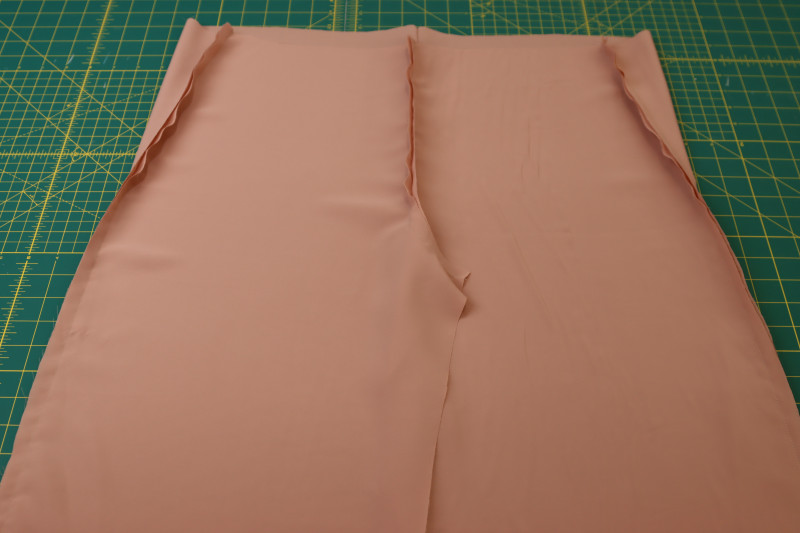 How To Pin Sew Inner Pants Side Seams - Blush Polyester Double Georgette - Mood Fabrics - Ojai Reversive Wide Leg Pants Free Sewing Pattern Tutorial - MDF545 - Mood Fabrics Sewciety Blog - Pin and sew the inner pants side seams.